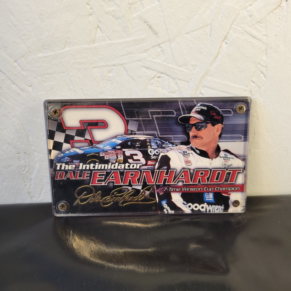 2001 Press Pass Dale Earnhardt gold signature card in a protective plastic